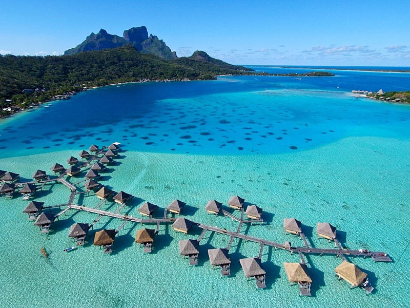 Aerial view of the overwater bungalows at the InterContinental Le Moana