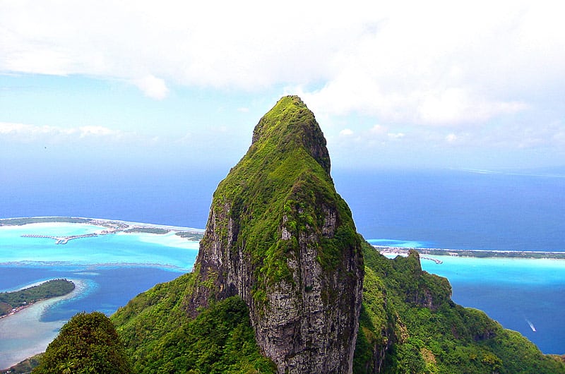 Premium Photo  A fantasy island with a mountain in the background