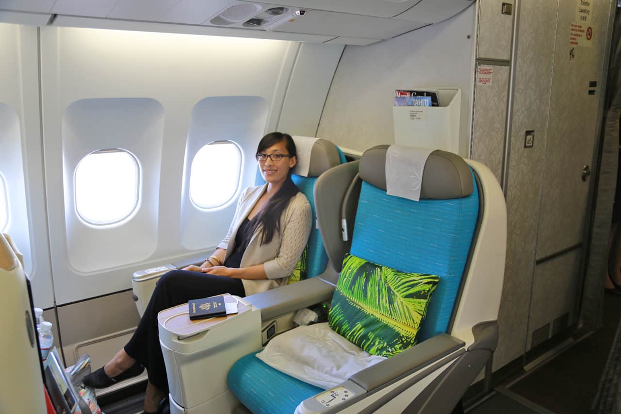 Jessica sitting in Air Tahiti Nui business class seats.