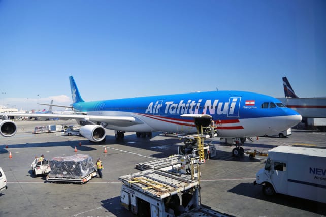 Air Tahiti Nui plane parked at LAX gate waiting to board | boraboraphotos.com