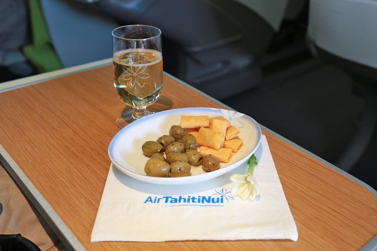 Champagne & snacks served before takeoff.