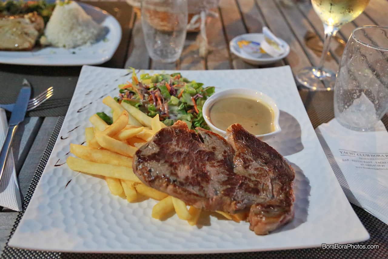 Bora Bora Yacht Club rib-eye steak and french fries.