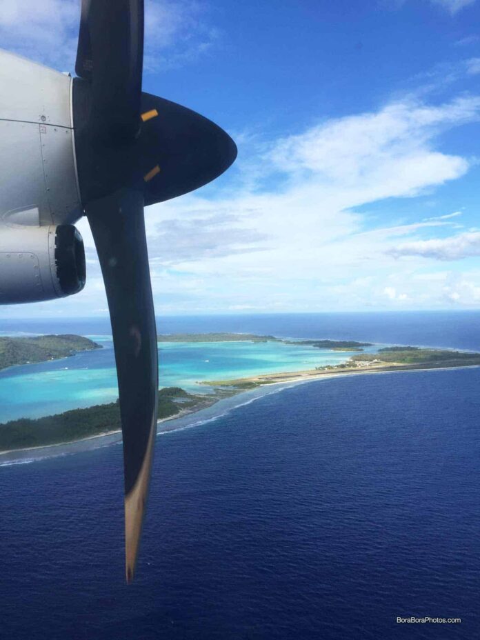 A view of Bora Bora airport from inside a plane.